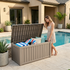 150 gallon light brown outdoor storage deck box beside pool for towels and outdoor accessories