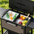 Close-up view of insulated cooler cart interior holding beverages and ice for outdoor events