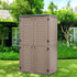 brown resin outdoor storage shed beside garden and lawn