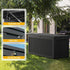 black 260 gallon outdoor storage box beside patio seating