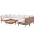 U-shaped brown wicker patio sectional sofa with beige cushions and matching low coffee table