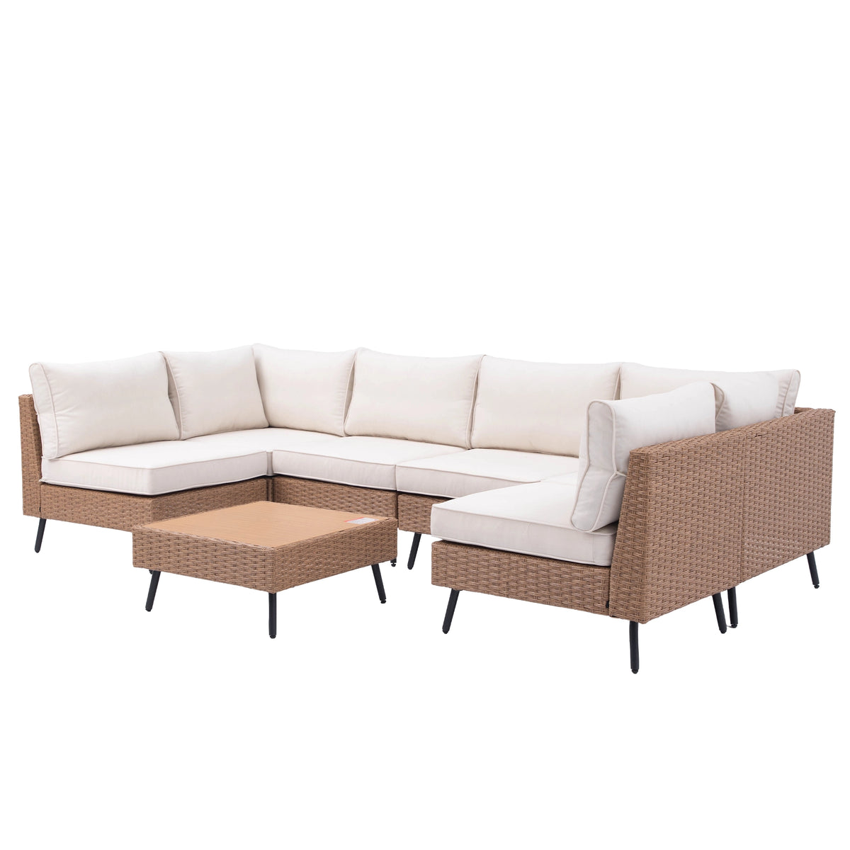 U-shaped brown wicker patio sectional sofa with beige cushions and matching low coffee table
