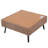 Angled view of outdoor wicker coffee table with wood-look tabletop and black legs