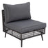 Angled view of armless patio sofa chair with thick grey cushions and open wicker frame