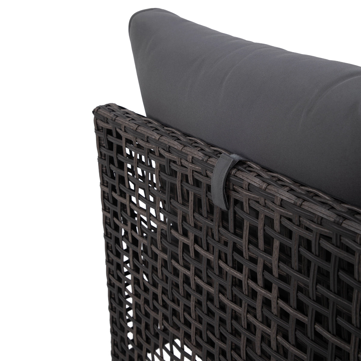 Close-up of hook-and-loop back cushion strap on grey PE rattan sofa