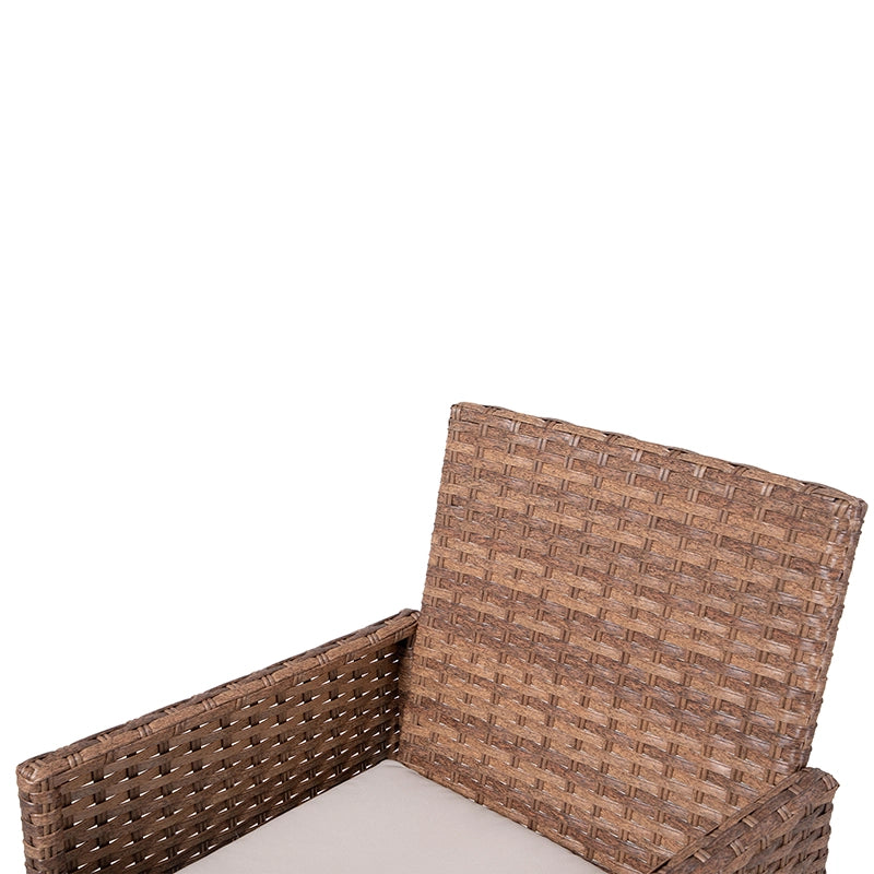 Brown wicker outdoor dining armchair with cushioned seat viewed from above