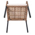 Underside of wicker dining armchair with woven seat and metal legs