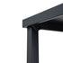 Close-up of black powder-coated metal table leg and frame joint