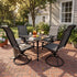 Two swivel patio chairs arranged in a garden seating area