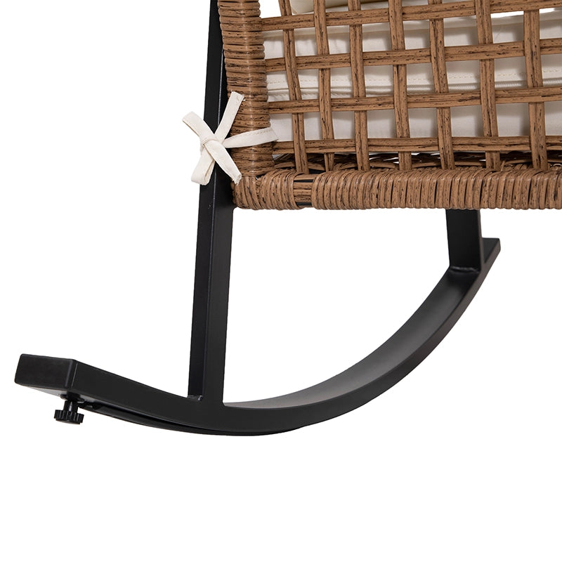 Woven wicker rocking chair base with curved metal runner detail