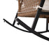 Close-up of curved rocker rails and metal support beneath wicker chair