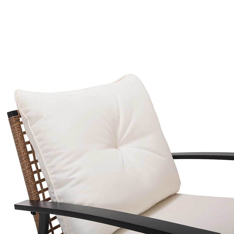 Close-up of soft back cushion on outdoor wicker rocking chair