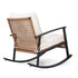 Side view of outdoor wicker rocking chair with curved metal runners