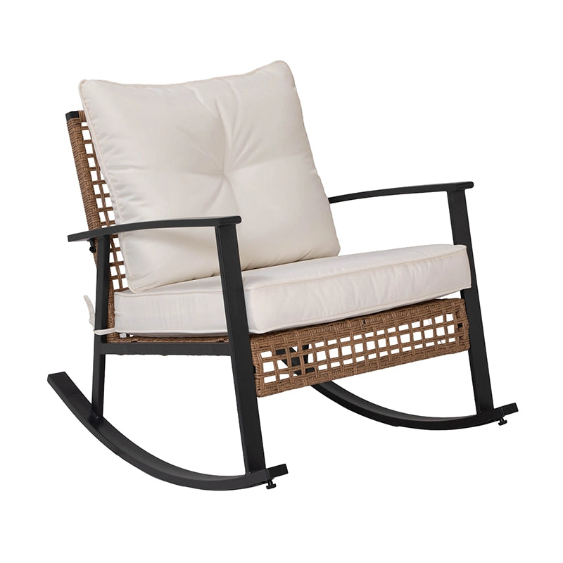 Angled front view of wicker porch rocker with padded cushions and armrests