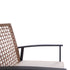 Close-up of wicker chair frame and curved rocking mechanism