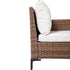 Side angle of cushioned rattan sectional sofa with raised armrest