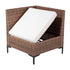 Angled view of cushioned rattan outdoor sofa seating section