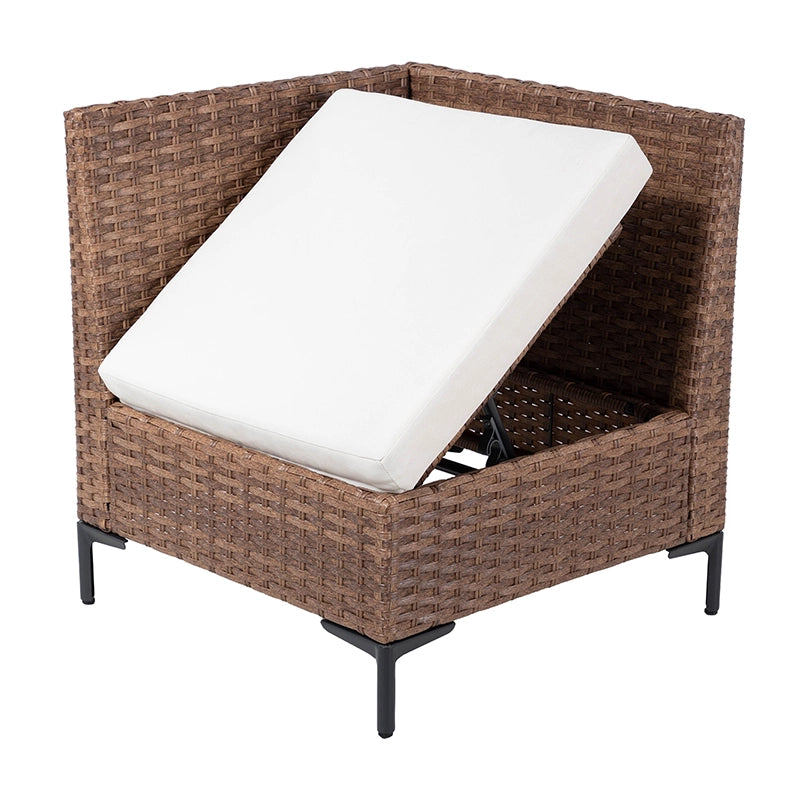 Angled view of cushioned rattan outdoor sofa seating section
