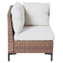 Front view of wicker corner sofa module with beige seat and back cushions