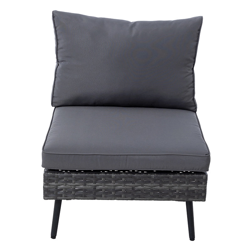 Front view of armless wicker patio sofa module with dark grey seat and back cushions
