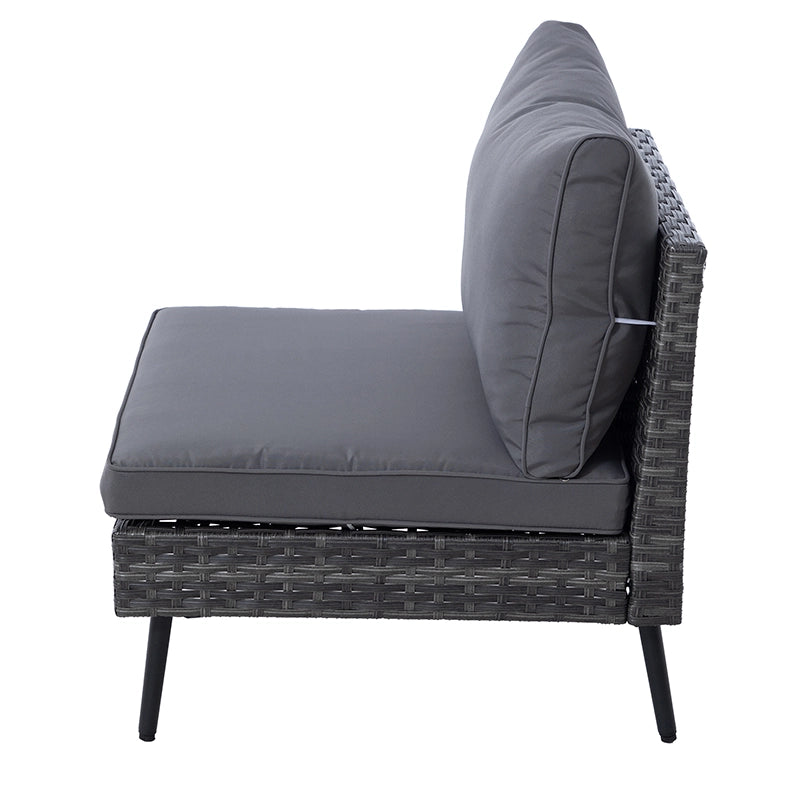 Side profile of cushioned wicker modular sofa with low woven base