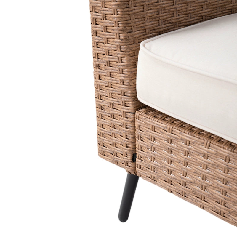 Detail of cushioned outdoor sectional sofa with woven side panel and tapered leg