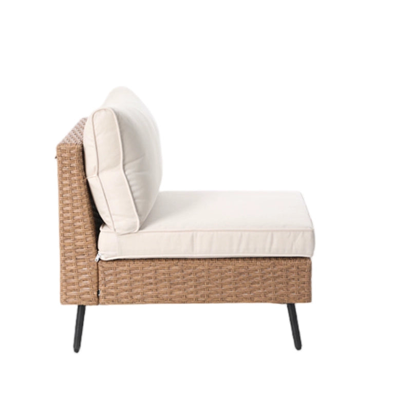 Side view of armless wicker patio sofa chair with seat and back cushions
