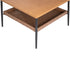 Angled underside view of wicker coffee table with wood-look top and metal legs