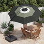 11 ft gradient cantilever patio umbrella with base over outdoor dining furniture