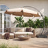 Champagne cantilever umbrella with valance above outdoor lounge seating