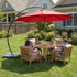 12 ft offset umbrella above an outdoor dining table and chairs