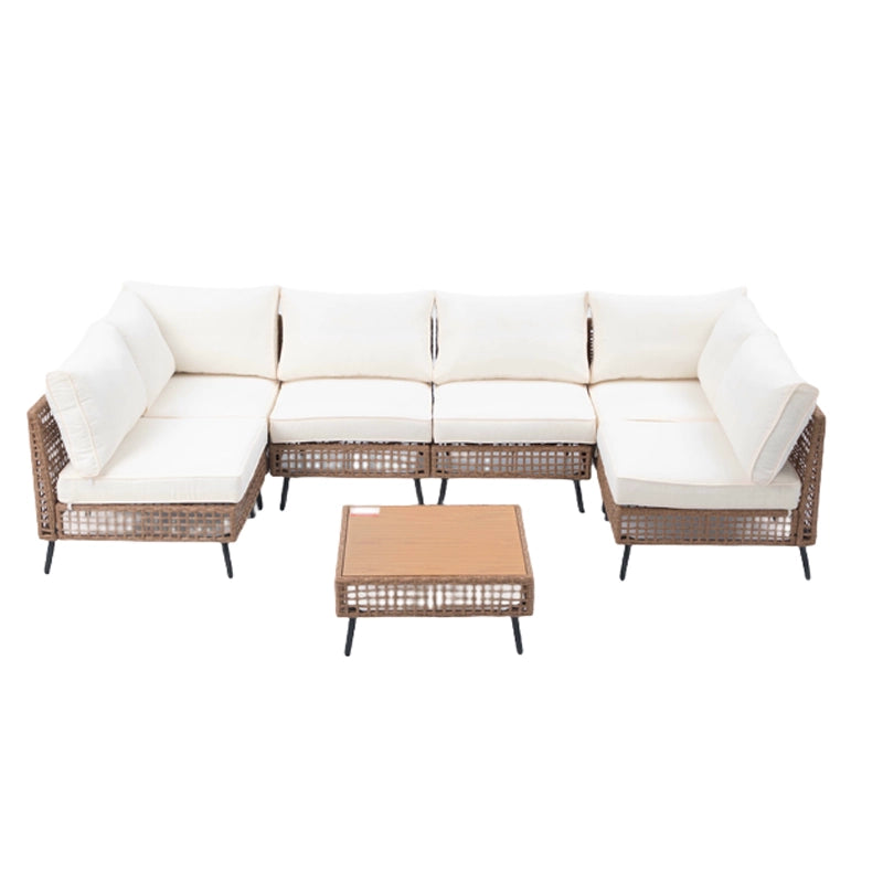 7 piece rattan patio furniture set with beige cushions and square coffee table