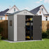 Outdoor storage shed with open doors in a residential backyard