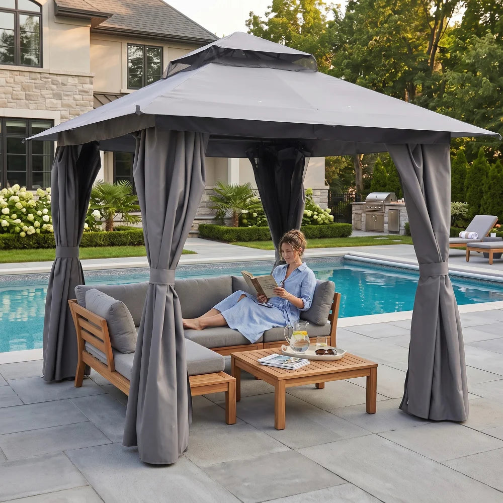 Gray outdoor gazebo with curtains for patio seating area