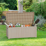 120 gallon deck box with open lid storing patio cushions and outdoor gear