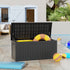 Black outdoor storage box with open lid for poolside gear and accessories