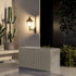 Coffee resin deck box in an outdoor patio setting