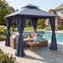 Navy blue outdoor gazebo beside pool and patio furniture
