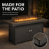 Teak-look fire pit table with tempered glass wind guard for patio seating
